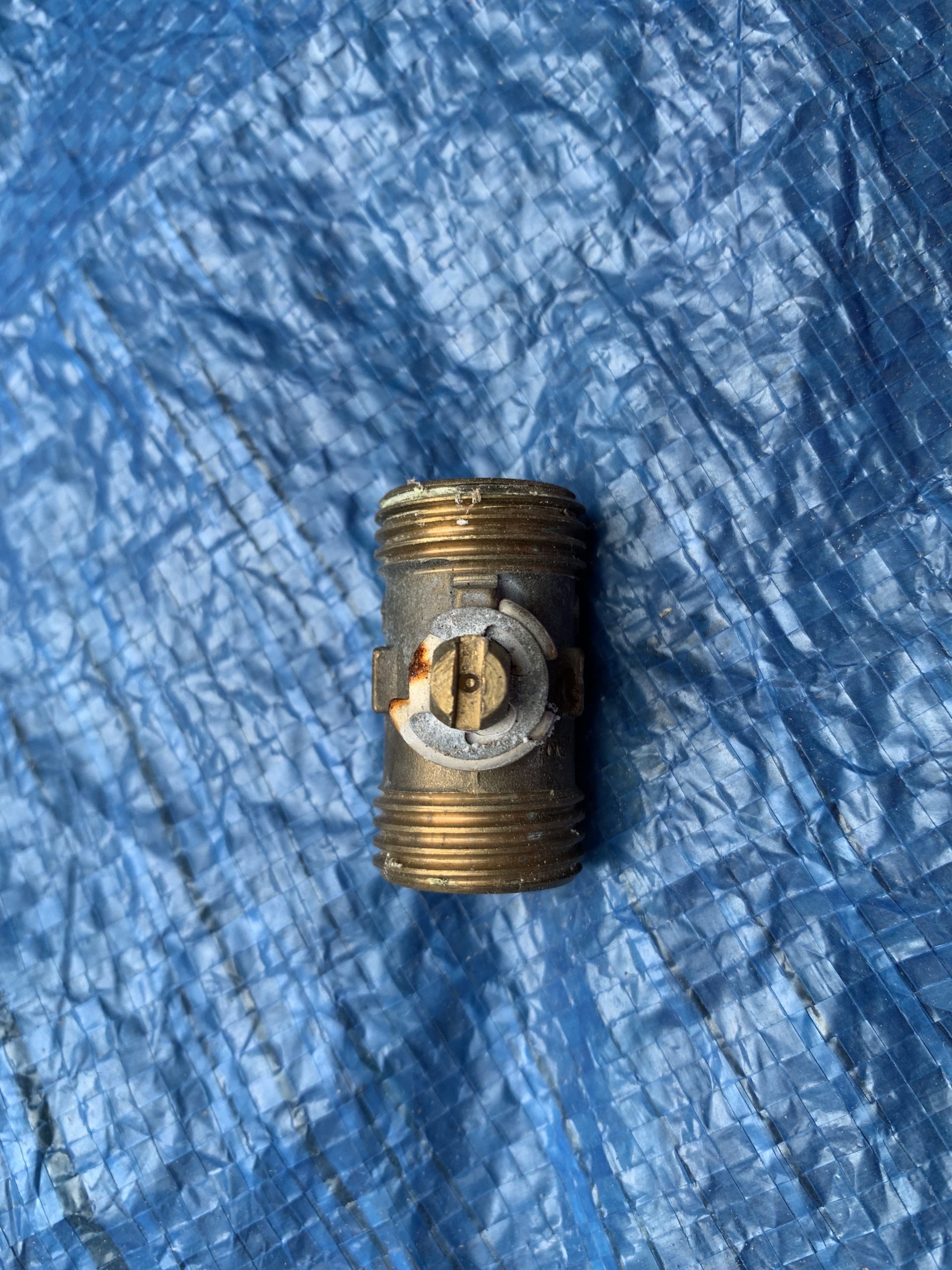 Photo of an isolation valve on a blue background